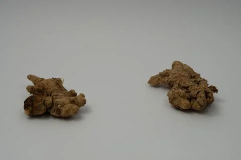 Ginger root isolated on white background Stock Photos