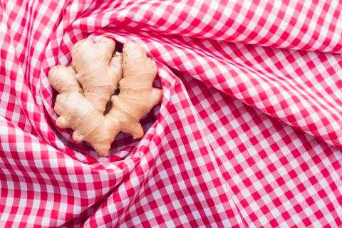 Ginger root on kitchen cloth Stock Photos