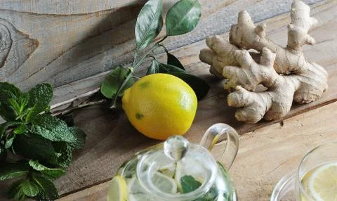 Ginger root, lemon and mint - ingredients for healthy tea Stock Photos