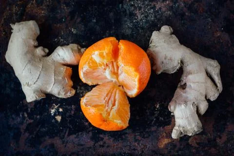 Ginger root with orange Stock Photos