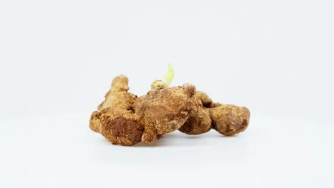 Ginger Root Rotating on White Background Isolated Video stock 325347857