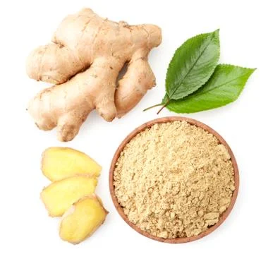 Ginger root, sliced and ground with green leaves on a white background. The v Stock Photos
