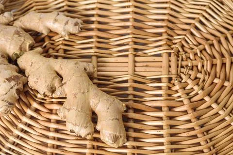 Ginger root on a wicker tray Stock Photos