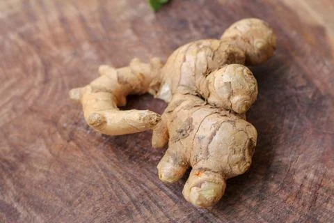 Ginger root  on wooden background Foto stock