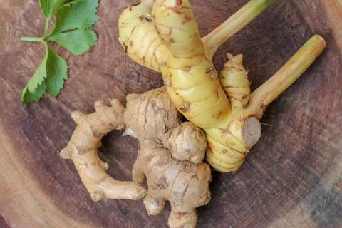Ginger root  on wooden background Stock Photos