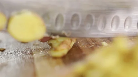 Ginger is Sliced into small Pieces Closeup 動画素材 99163140