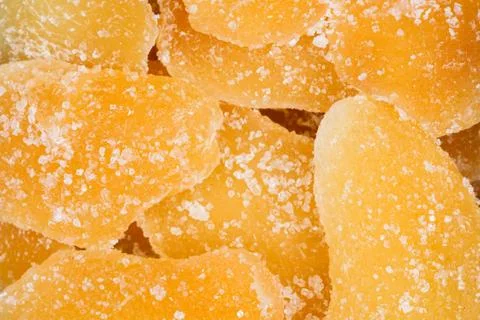 Ginger slices background, on macro. Stock Photos