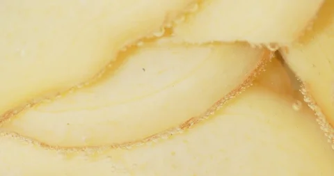 Ginger slices under water with air bubbles. Stock Footage 128240617