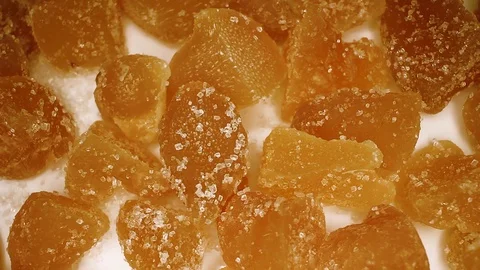 Ginger Spicy Ginger Slices on Rotating Rolling Plate Background Video For Any Stock Footage 127499944