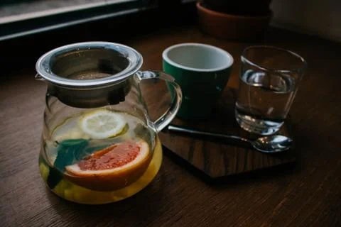 Ginger tea with mint and lemon and grapefruit. Herbal healthy drink in the te Stock Photos