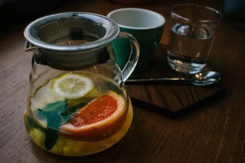 Ginger tea with mint and lemon and grapefruit. Herbal healthy drink in the te Stock Photos