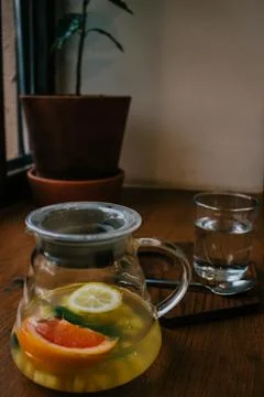 Ginger tea with mint and lemon and grapefruit. Herbal healthy drink in the te Stock Photos
