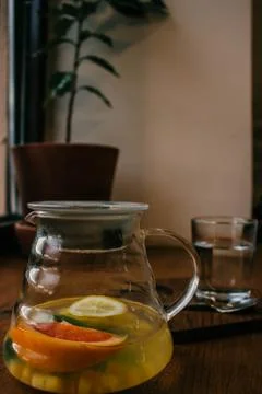 Ginger tea with mint and lemon and grapefruit. Herbal healthy drink in the te Stock Photos