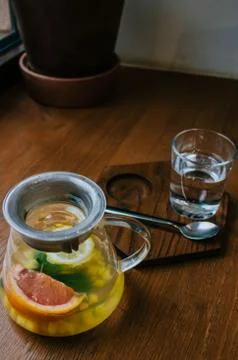 Ginger tea with mint and lemon and grapefruit. Herbal healthy drink in the te Stock Photos