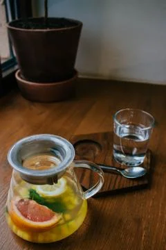 Ginger tea with mint and lemon and grapefruit. Herbal healthy drink in the te Stock Photos