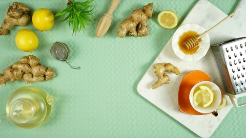 Ginger tea served with lemon and honey stop motion animation. Stock Footage
