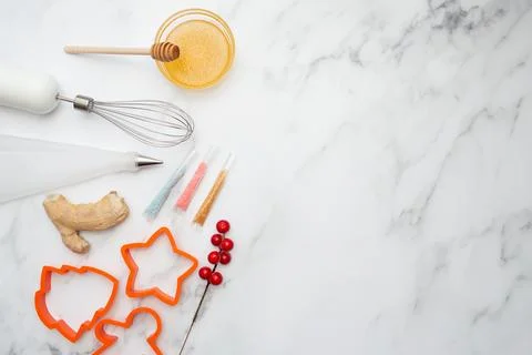 Gingerbread baking pans, cooking tools and ingredients on the table. Place for Stock Photos