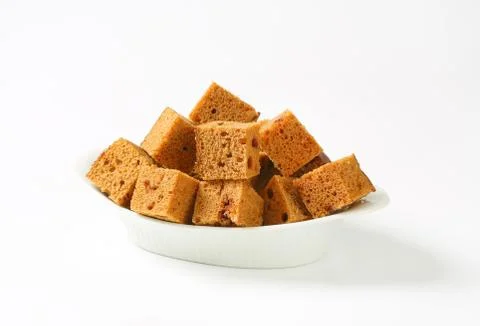 Gingerbread cake cut into bite-sized squares Stock Photos