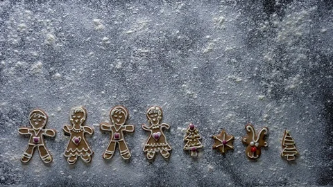 Gingerbread characters on white icing winter background with copy space Stock Footage 112324599