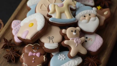 Gingerbread as a Christmas staple, sweet biscuits for the holiday. Gingerbread a Stock Footage 340659066