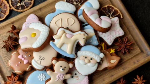 Gingerbread as a Christmas staple, sweet biscuits for the holiday. Gingerbread a Stock Footage 340659204