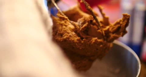 Gingerbread cookie batter in mixer close up stirring Stock Footage 217357046