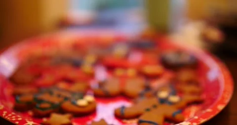 Gingerbread cookie being placed on cookie tray ready to be eaten Stock Footage 217361130