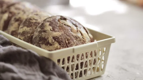 Gingerbread cookies in a basket by the window in the light Stock Footage 114748604