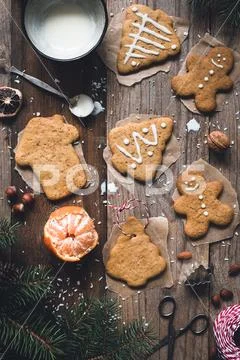 Gingerbread cookies with icing decoration process Stock Photos