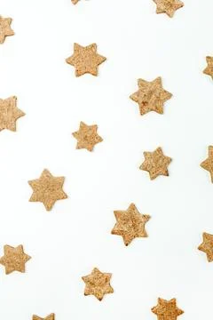 Gingerbread cookies pattern on white background. Stock Photos