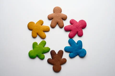 Gingerbread cookies in the shape of men of different colors - yellow, brown,  Stock Photos