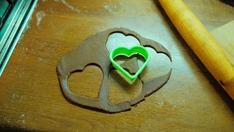 Gingerbread Dough With Heart Cookie Cutouts Ready For Homemade Baking Stock Footage 341394162