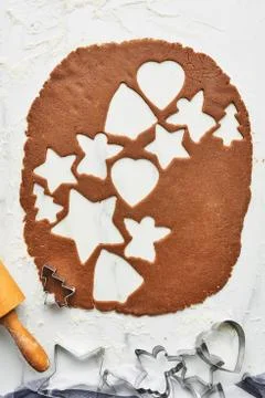 Gingerbread dough with various shape cookie cutout. Stock-Fotos