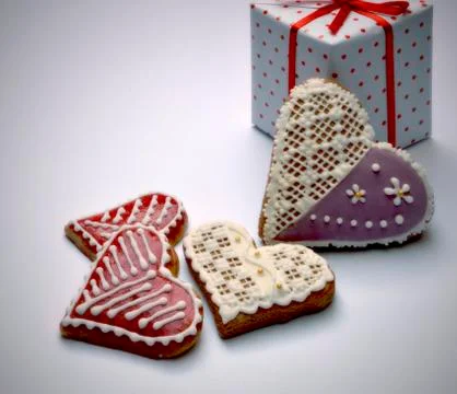 Gingerbread hearts with the package Stock Photos