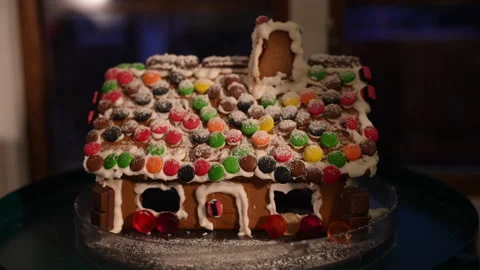 Gingerbread house covered in candy and frosting Stock Footage 285753368
