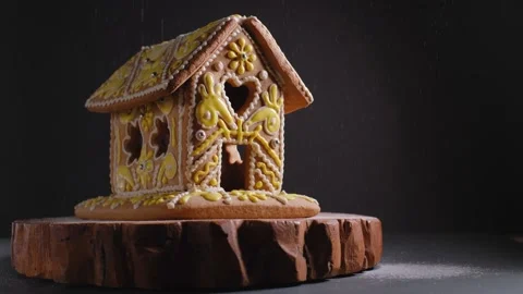 Gingerbread house falling Snow on the black for Christmas Stock Footage 164193140