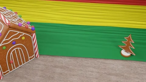 Gingerbread house with the flag of Bolivia on the table Video stock 167764650