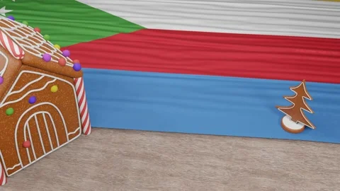 Gingerbread house with the flag of Comoros on the table Stock Footage 167764673