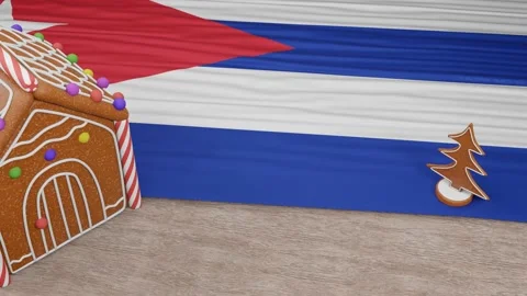 Gingerbread house with the flag of Cuba on the table Stock Footage 167764677