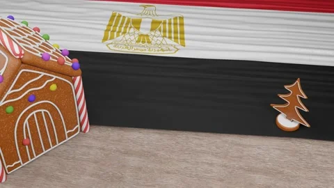 Gingerbread house with the flag of Egypt on the table Stock Footage 167764687