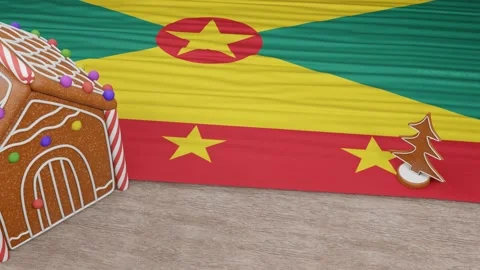 Gingerbread house with the flag of Grenada on the table Video stock 167764706