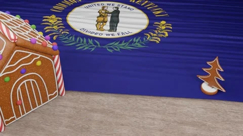 Gingerbread house with the flag of Kentucky on the table 스톡 동영상 167764893