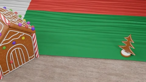 Gingerbread house with the flag of Madagascar on the table Stock Footage 167764754