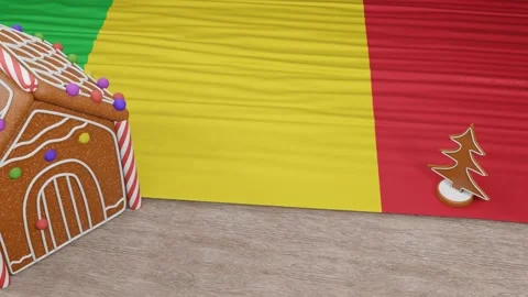 Gingerbread house with the flag of Mali on the table Video stock 167764762