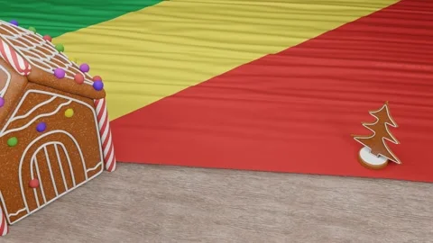 Gingerbread house with the flag of Republic of the Congo on the table Video stock 167764813
