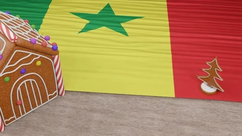 Gingerbread house with the flag of Senegal on the table Stock Footage 167764820