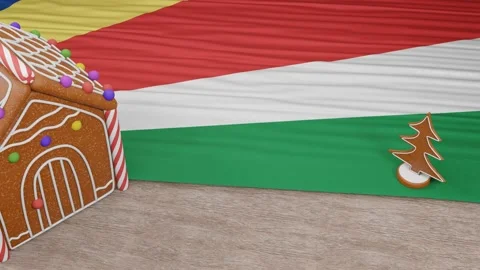 Gingerbread house with the flag of Seychelles on the table Stock Footage 167764824