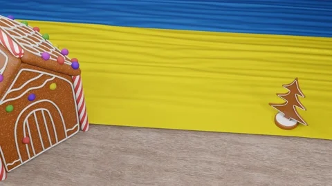 Gingerbread house with the flag of Ukraine on the table Stock Footage 167764859