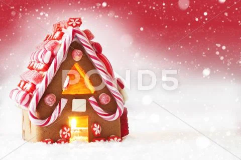 Gingerbread House, Red Background With Snowflakes, Copy Space Stock Photos