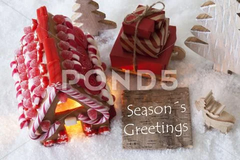 Gingerbread House, Sled, Snow, Text Seasons Greetings Stock Photos